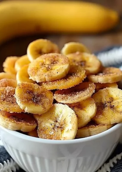 Cinnamon-sugar air fryer banana chips on a serving plate