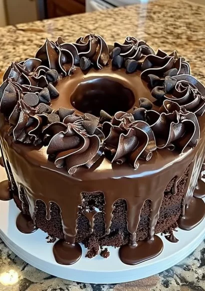 Decadent Death by Chocolate Cake topped with chocolate frosting and garnish