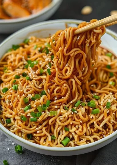 Bowl of easy saucy ramen noodles with thick, flavorful sauce