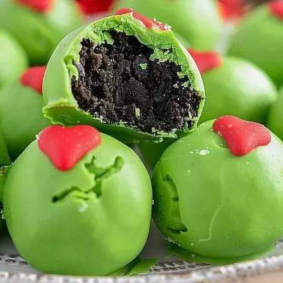 Festive Grinch Oreo Balls decorated for the holiday season