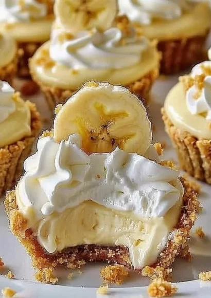 No-Bake Mini Banana Cream Pies topped with whipped cream and banana slices