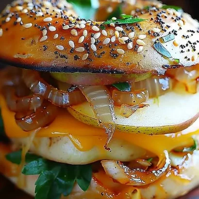 Thumbnail for Pear Apple Cheddar Caramelized Onion Grilled Cheese Bagel Sandwich