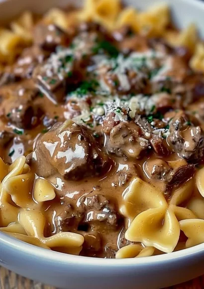 Delicious slow cooker creamy garlic beef pasta served in a bowl.